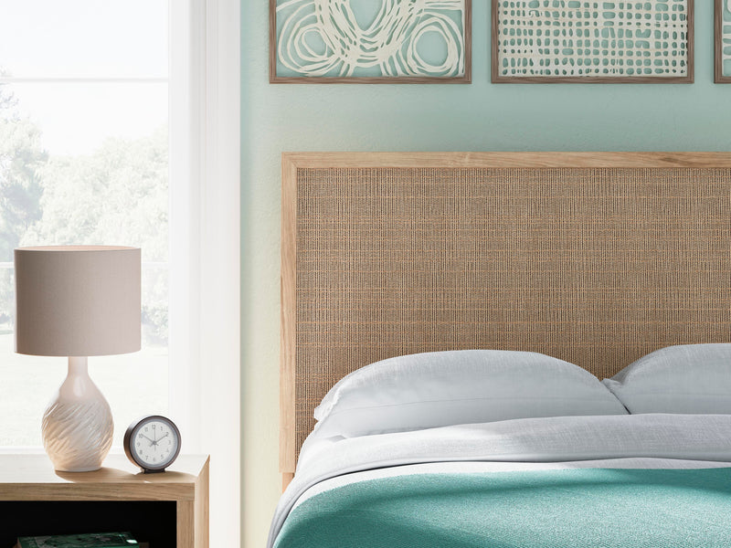 Ashley Furniture Cielden bedroom set with a dark wood finish, including a bed frame, dresser, and nightstands in a stylish bedroom.