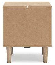 Ashley Furniture Cielden Bedroom Set featuring a bed frame with a headboard, matching nightstands, and bedroom decor.