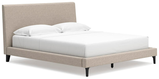 Ashley Furniture Cielden upholstered bed with roll slats, featuring a stylish headboard and frame in a cozy bedroom setting.