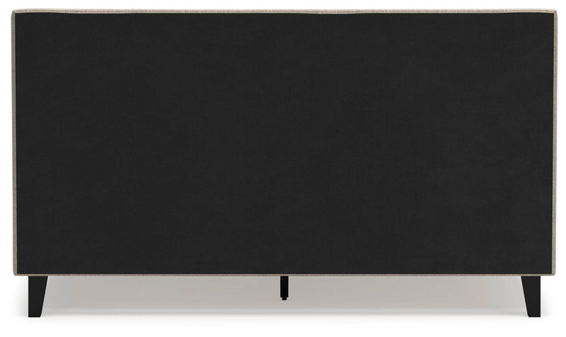 Ashley Furniture Cielden upholstered bed with roll slats, shown from the back with a dark fabric and sturdy wooden frame.