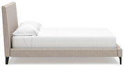 Ashley Furniture Cielden upholstered bed with roll slats, featuring a padded headboard and wooden side panels.