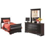 Ashley Furniture Huey Vineyard bedroom set including bed frame, dresser, and nightstands with a rustic wood finish.