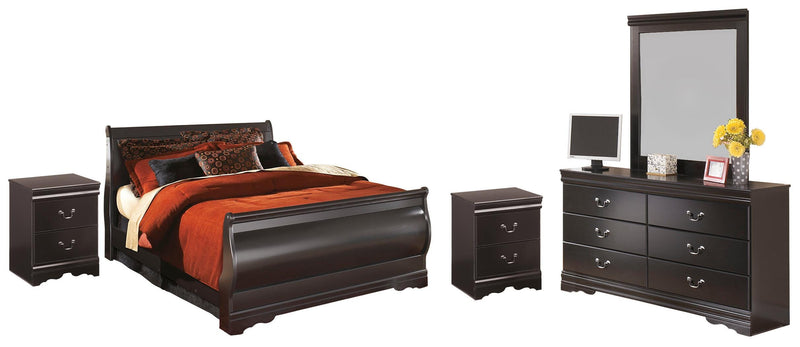 Ashley Furniture Huey Vineyard bedroom set featuring a bed, nightstands, and dresser with a rustic wood finish.