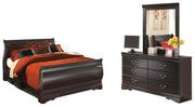 Ashley Furniture Huey Vineyard bedroom set with a bed, dresser, and nightstands in a rustic wood finish.