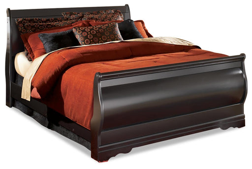 Ashley Furniture Huey Vineyard Bed in warm wood finish with a classic slatted headboard and sturdy frame.
