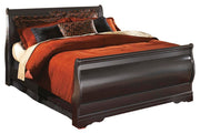 Ashley Furniture Huey Vineyard bedroom set with matching bed frame, dresser, and nightstands in a rustic wood finish.