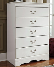 Ashley Furniture Anarasia chest of drawers with a warm wood finish and multiple spacious drawers, shown in a close-up image.