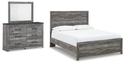 Ashley Furniture Bronyan bedroom set with a bed, dresser, and nightstands in a modern bedroom scene.