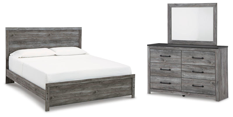 Ashley Furniture Bronyan bedroom set with a modern bed frame, nightstands, and dresser in a stylish bedroom setting.