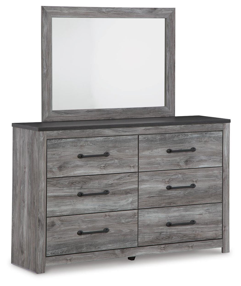 Ashley Furniture Bronyan bedroom set with a stylish bed, matching nightstands, and dresser in a modern bedroom layout.