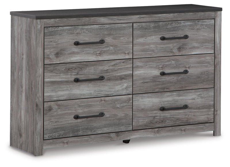 Ashley Furniture Bronyan dresser with multiple drawers, wood finish, and modern design, shown from an angled closed view.