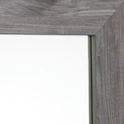 Ashley Furniture Bronyan bedroom set with a modern wood finish, including a bed frame, dresser, and nightstands.