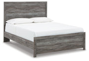 Ashley Furniture Bronyan bedroom set with a bed, nightstands, and dresser in a modern bedroom scene.