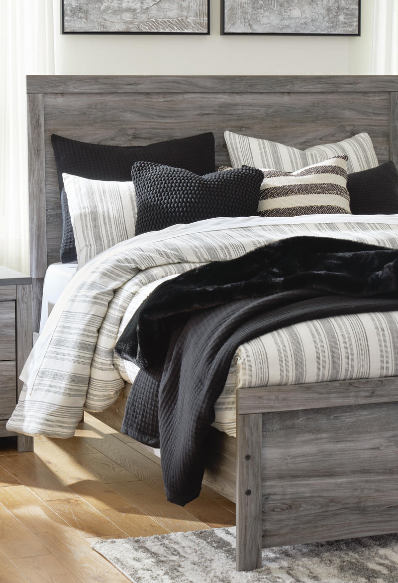Ashley Furniture Bronyan bedroom set with a modern bed frame, matching nightstands, and coordinated bedroom furniture in a stylish design.