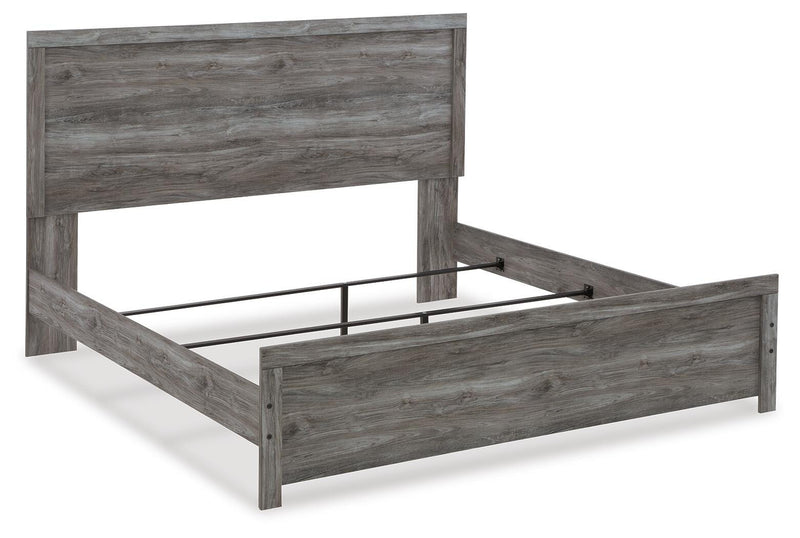 Ashley Furniture Bronyan bedroom set with a bed, nightstands, and dresser in a modern design, shown from an angled view.