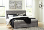 Ashley Furniture Bronyan bedroom set featuring a modern bed frame, matching nightstands, and a coordinated dresser in a stylish bedroom.