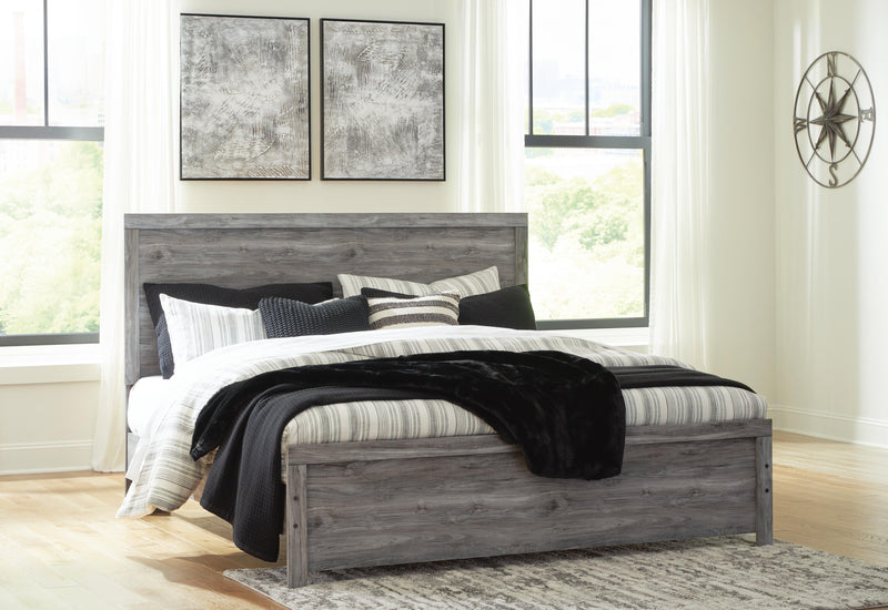 Ashley Furniture Bronyan bedroom set featuring a modern bed frame, matching nightstands, and a coordinated dresser in a stylish bedroom.