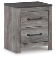 Ashley Furniture Bronyan nightstand with a closed drawer and wood finish, featuring a sleek, modern design for bedroom decor.