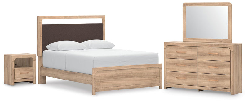 Ashley Furniture Kinlanni bedroom set with a modern bed frame, matching nightstands, and a coordinated dresser in a stylish bedroom.