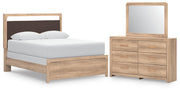 Ashley Furniture Kinlanni bedroom set featuring a bed frame, nightstands, and dresser in a stylish bedroom arrangement.