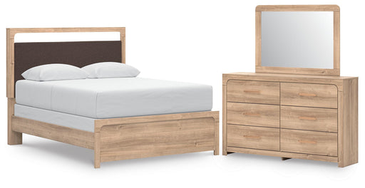 Ashley Furniture Kinlanni bedroom set featuring a bed frame, nightstands, and dresser in a stylish bedroom arrangement.
