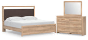Ashley Furniture Kinlanni bedroom set with a bed, matching nightstands, and dresser in a modern bedroom scene.