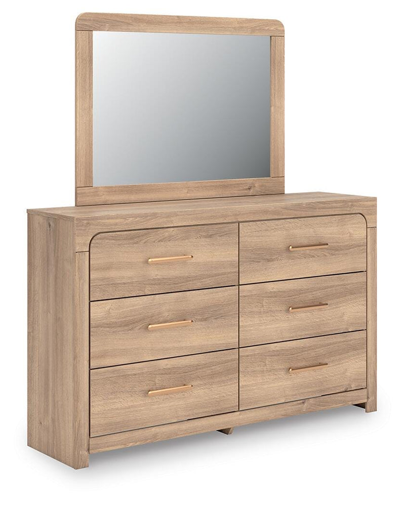 Ashley Furniture Kinlanni bedroom set featuring a modern bed frame, matching nightstands, and a stylish dresser in a cozy bedroom scene.