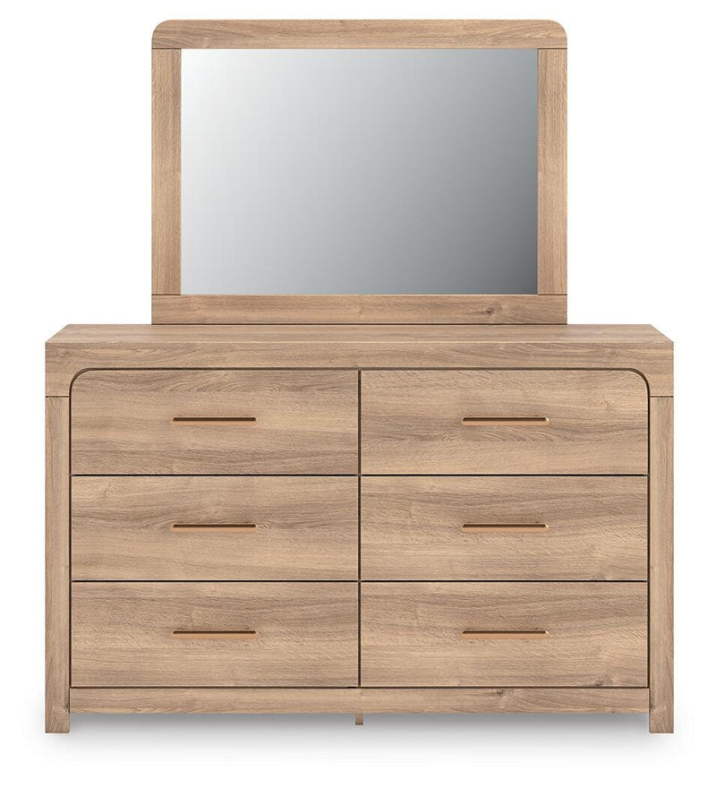 Ashley Furniture Kinlanni bedroom set featuring a modern bed frame with a headboard and matching nightstands in a stylish bedroom.