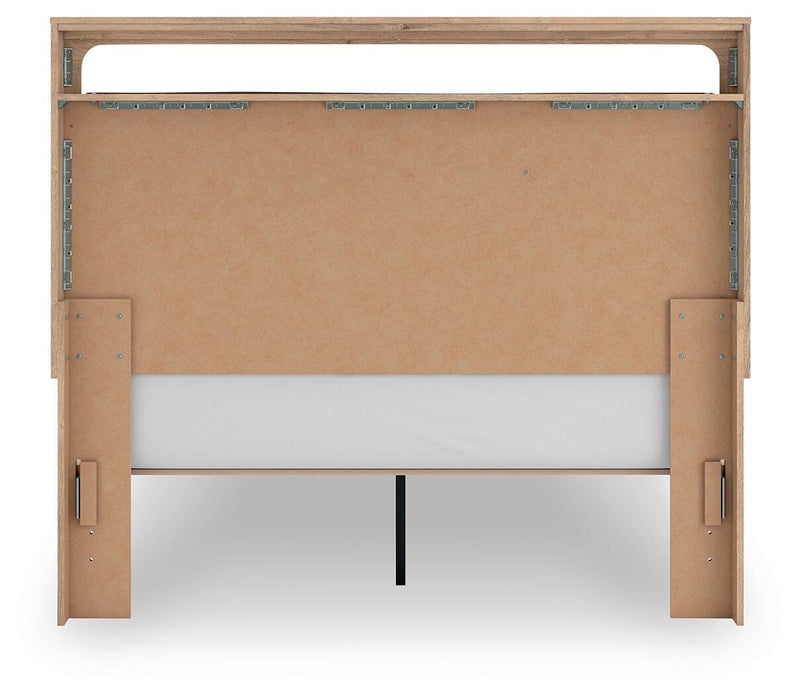 Ashley Furniture Kinlanni bedroom set featuring a bed frame, nightstands, and dresser in a modern bedroom design.