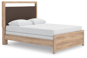 Ashley Furniture Kinlanni bedroom set with a bed, nightstands, and dresser, featuring a contemporary design and soft neutral tones.