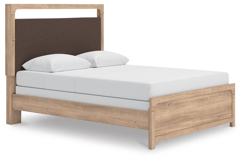 Ashley Furniture Kinlanni bedroom set with a bed, nightstands, and dresser, featuring a contemporary design and soft neutral tones.