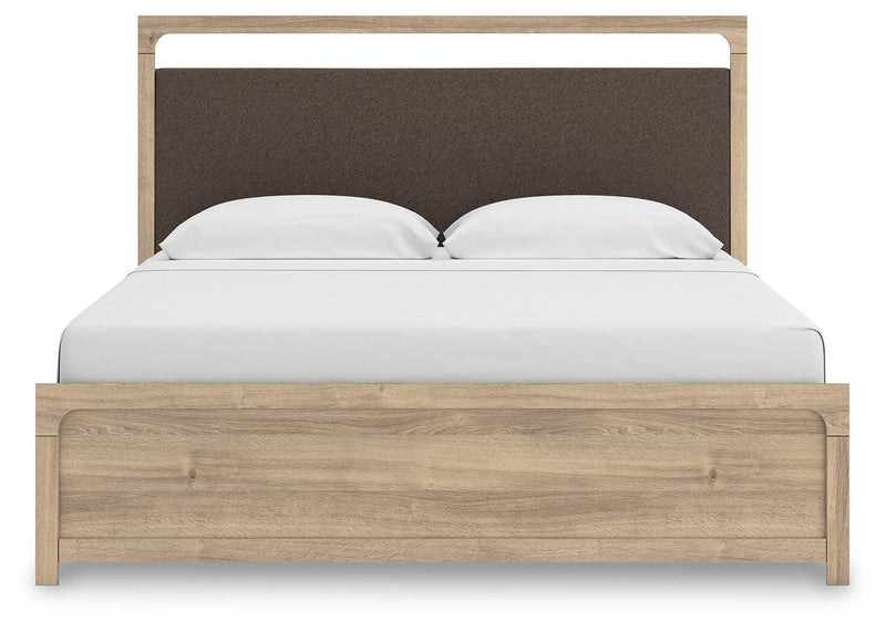Ashley Furniture Kinlanni bedroom set with a stylish bed frame, matching nightstands, and coordinating bedroom decor in a cozy setting.