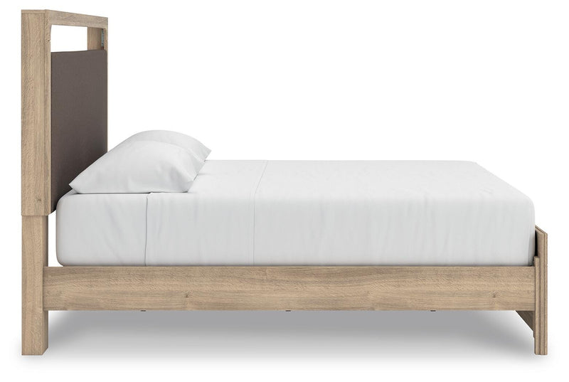 Ashley Furniture Kinlanni bedroom set featuring a stylish bed with a headboard and matching side tables in a modern bedroom design.