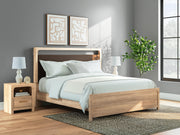 Ashley Furniture Kinlanni bedroom set featuring a stylish bed frame, matching nightstands, and a coordinated dresser in a modern design.