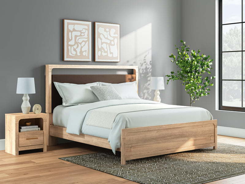 Ashley Furniture Kinlanni bedroom set featuring a stylish bed frame, matching nightstands, and a coordinated dresser in a modern design.