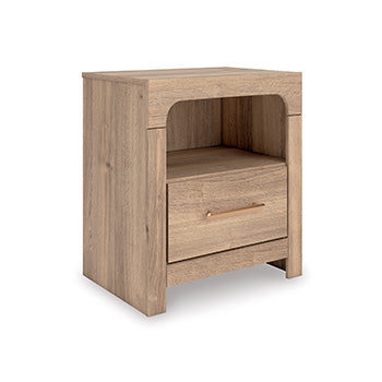 Ashley Furniture Kinlanni bedroom set with a stylish bed, matching nightstands, and a cozy, modern bedroom design.