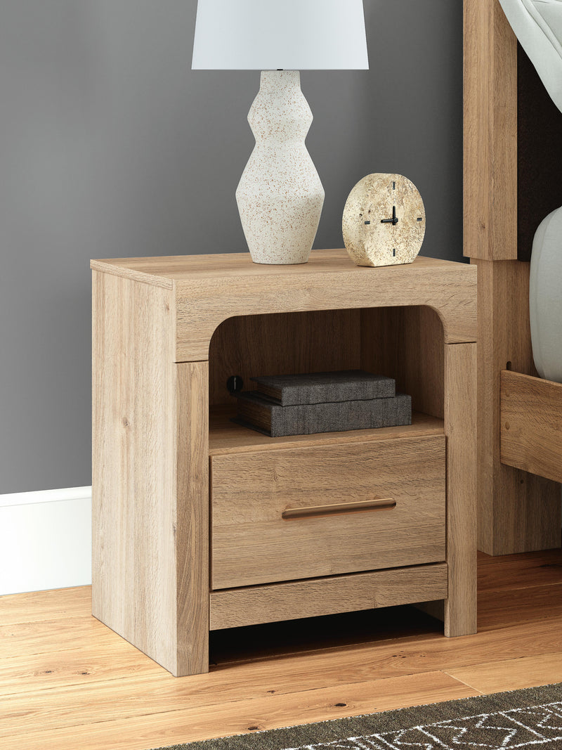 Ashley Furniture Kinlanni bedroom set with a modern bed frame, matching nightstands, and elegant bedroom decor.