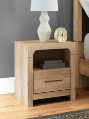 Ashley Furniture Kinlanni bedroom set with a bed, dresser, and nightstands in a modern bedroom layout.