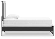 Ashley Furniture Maribel Bed with a wooden frame and upholstered headboard, shown in a modern bedroom setting.