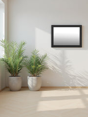 Ashley Furniture Maribel bedroom mirror with a sleek rectangular design and a polished wood frame.