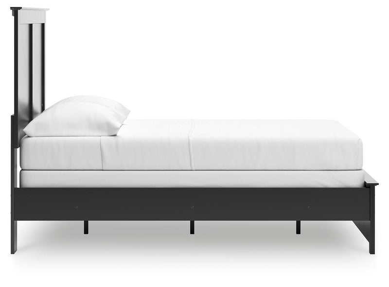 Ashley Furniture Maribel Bed with a sleek, modern design shown from the side in a stylish bedroom setting.