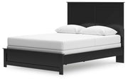 Ashley Furniture Maribel Bed with a stylish upholstered headboard and wooden frame, shown from an angled side view.