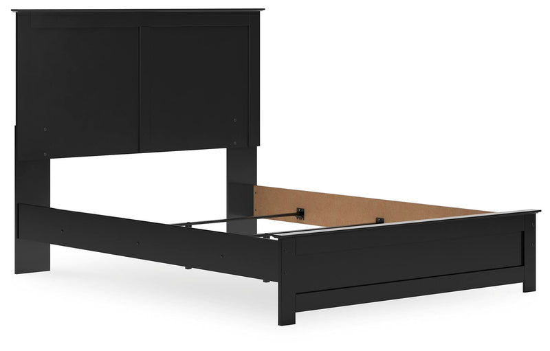 Ashley Furniture Maribel Bed with a stylish upholstered headboard and sleek frame, viewed from an angle.