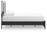 Ashley Furniture Maribel Bed with dark wood finish, showcasing the elegant headboard and sturdy frame design.