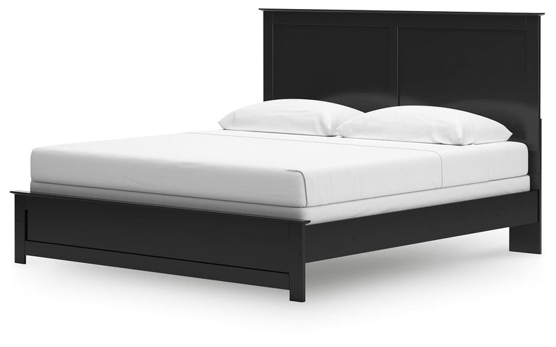 Ashley Furniture Maribel Bed with elegant wooden frame and upholstered headboard, shown from an angled view.
