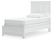 Ashley Furniture Bostwick Shoals bed with a wooden headboard and footboard in a rustic finish, shown from an angled side view.