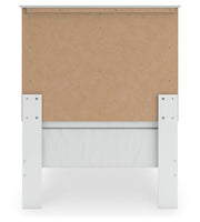 Ashley Furniture Bostwick Shoals Bed with a classic wooden frame and detailed headboard design.