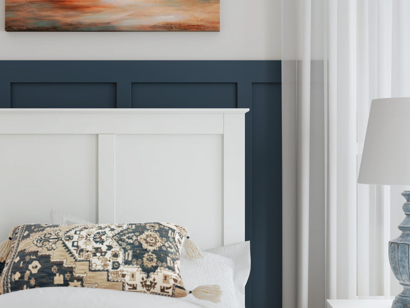 Close-up of the Ashley Furniture Bostwick Shoals Bed showcasing its detailed wood finish and elegant design features.