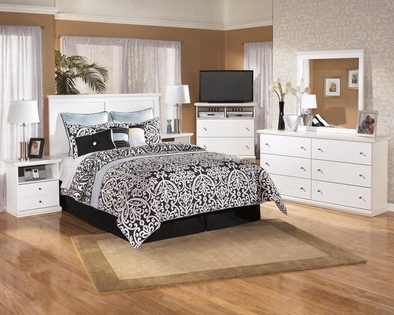 Ashley Furniture Bostwick Shoals youth dresser with multiple drawers and a dark wood finish, showcasing its modern design.