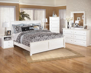 Ashley Furniture Bostwick Shoals nightstand with a dark wood finish and classic design, featuring a single drawer and open shelf.